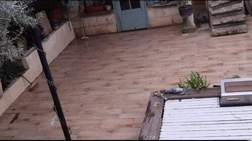 artisan maçon a aiguse mortes creation d'une terrasse carrelée terminée